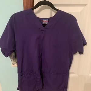 set of three purple and blue scrub tops